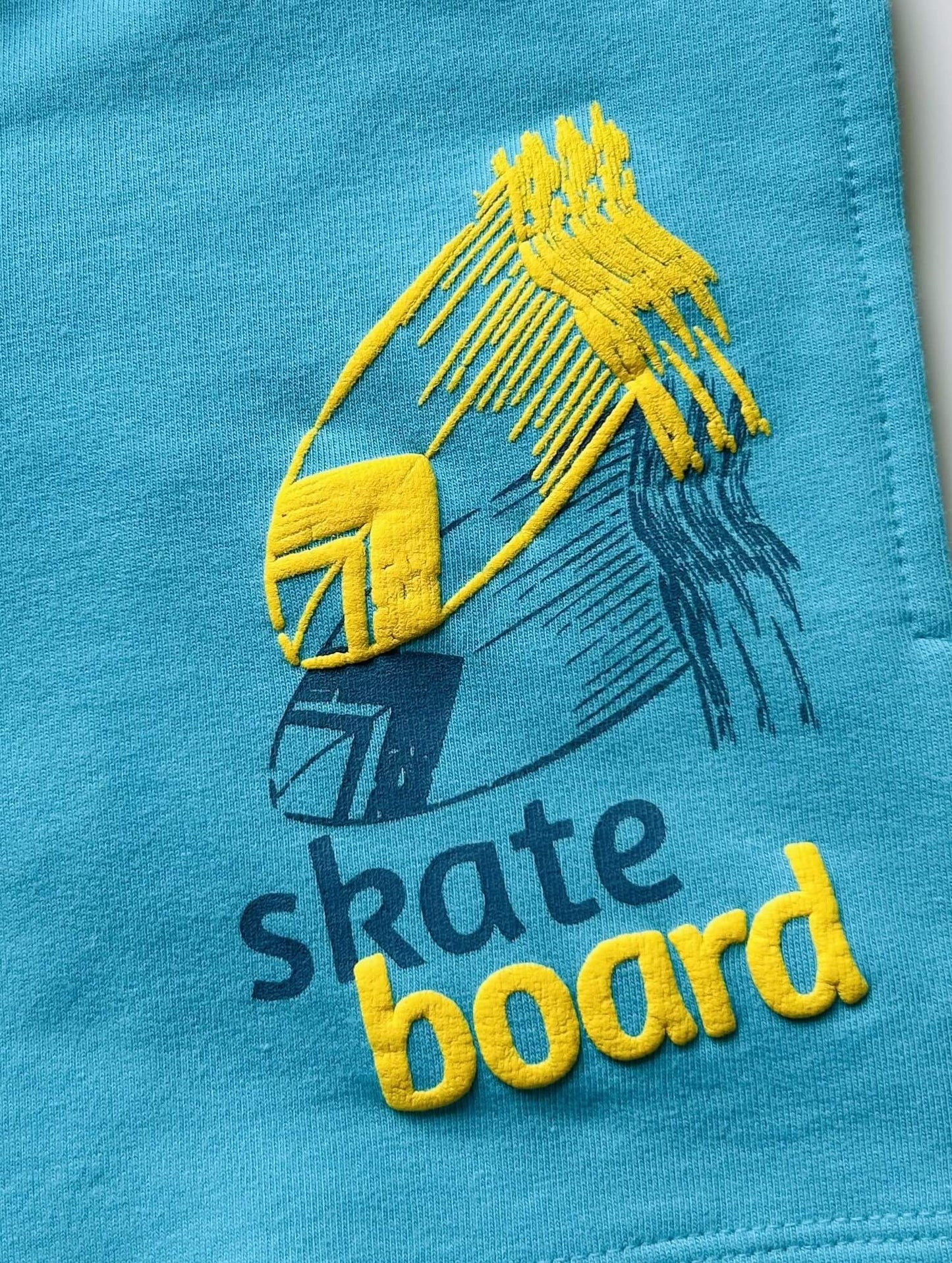 Short Skateboard bleu